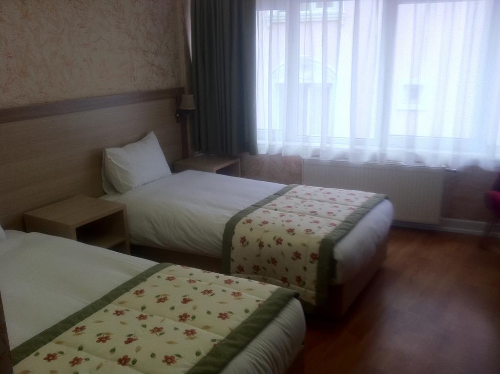 Hatay Hotel Истанбул Стая снимка